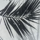 A close-up of a palm leaf pattern in black and white, showing the detailed veins and texture of the leaf against a light background.