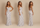 Three views of a woman modeling a floor-length satin gown with a gray and white marble pattern. Marquesa Maxi dress